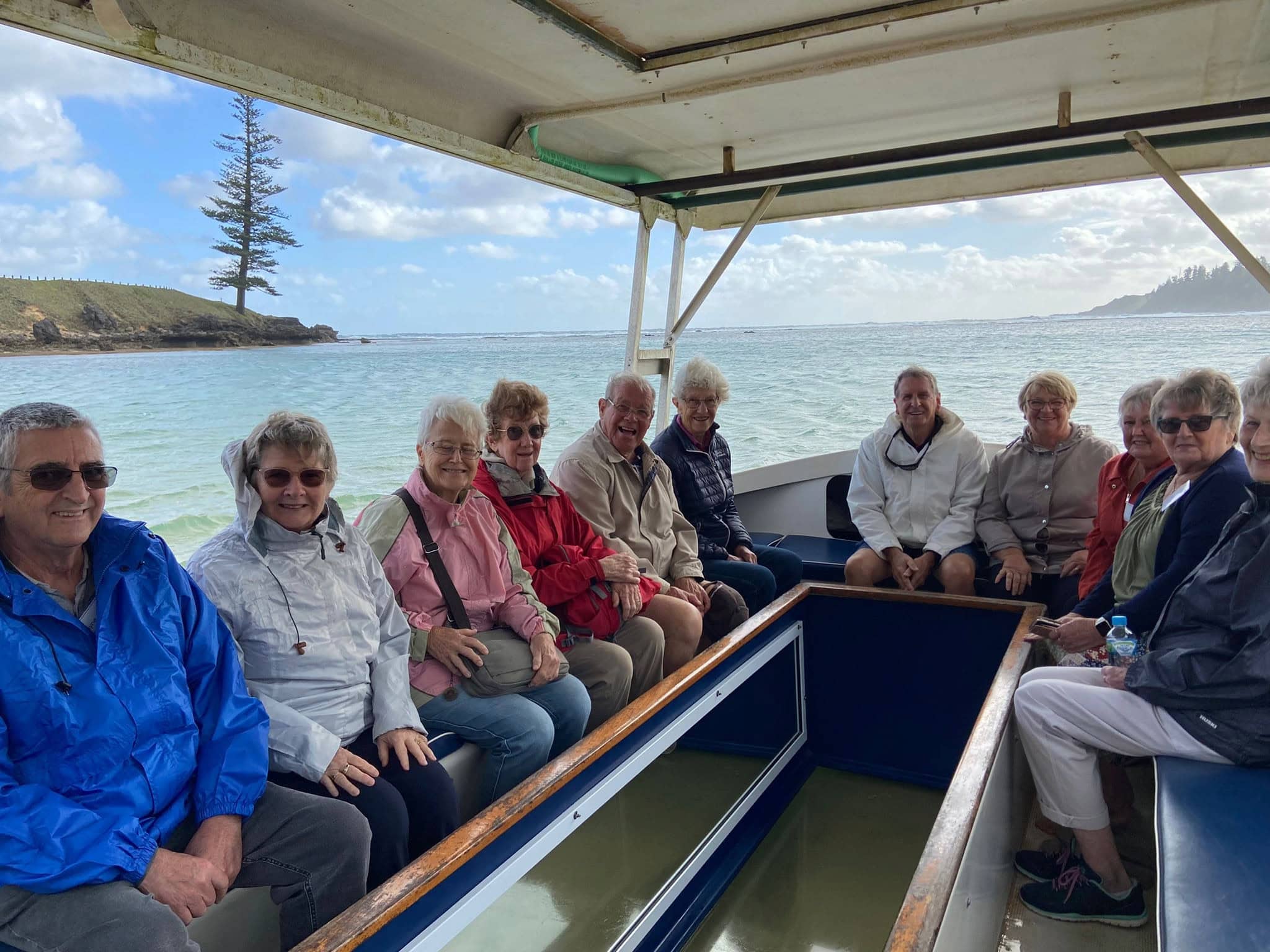 Escorted Tour group on Glass Bottom Boat, Emily Bay